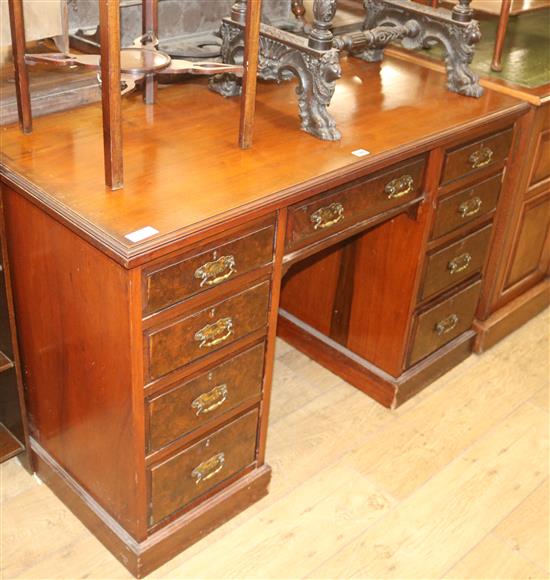 A Victorian walnut kneehole desk, W.122cm